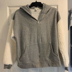 Gray zip up hooded sweatshirt with Sherpa on arms